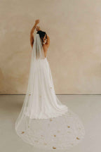 Voile – Motifs lunes, étoiles et soleils